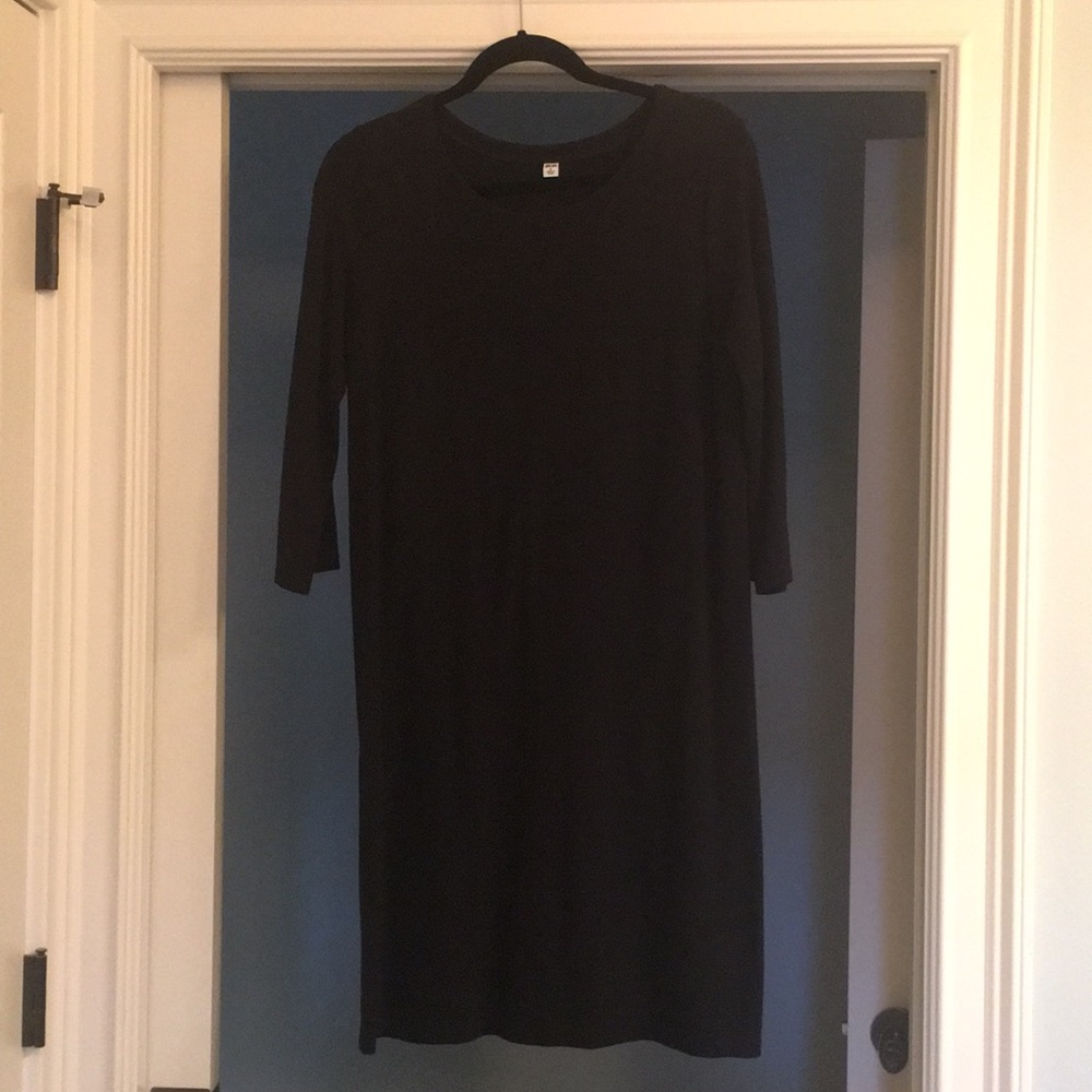 Uniqlo stretchy black midi dress with 3/4 sleeves.
